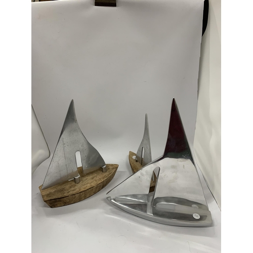 88 - A COLLECTION OF THREE DANISH CHROME SHIP MODELS