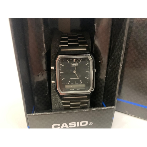 604 - A BOXED CASIO DUEL WRIST WATCH