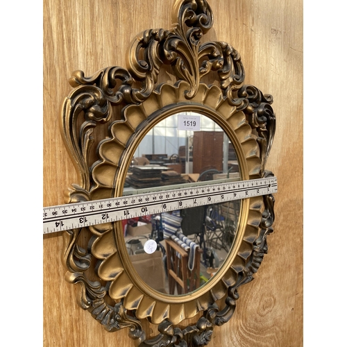 1519 - A DECORATIVE GILT FRAMED WALL MIRROR