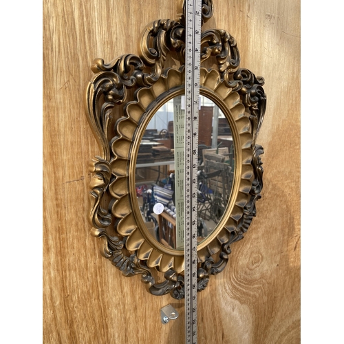 1519 - A DECORATIVE GILT FRAMED WALL MIRROR