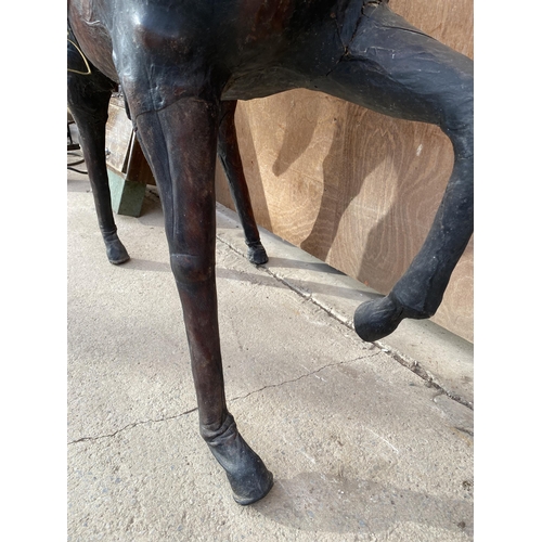 1526 - A LARGE VINTAGE LIBERTY STYLE LEATHER COVERED HORSE, HEIGHT 100CM, LENGTH 122CM