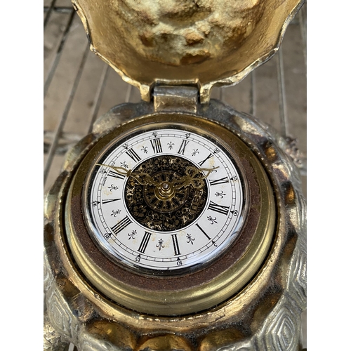 1554 - A SMALL DECORATIVE DESK TOP CLOCK WITH TURTLE CASING