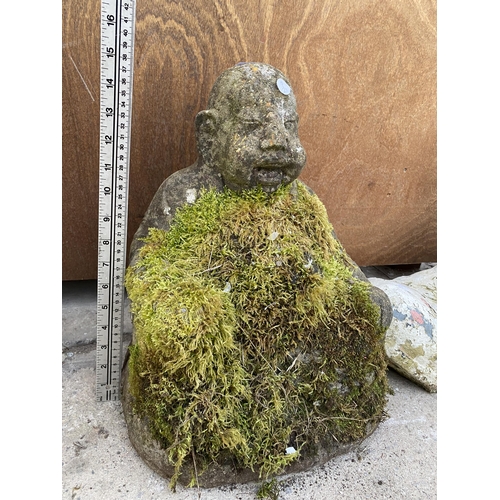 1562 - A RECONSTITUTED STONE BUDDHA FIGURE