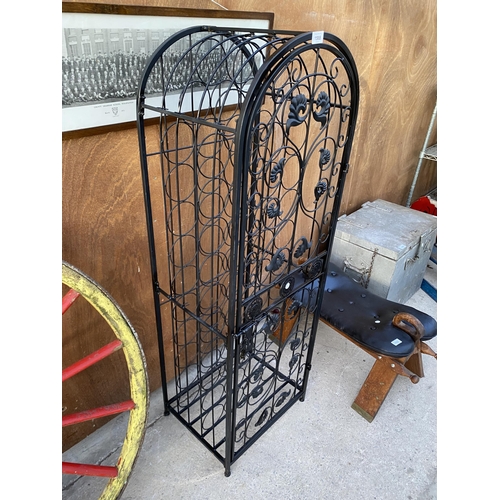 1588 - A METAL 45 SECTION WINE RACK WITH HINGED DOOR