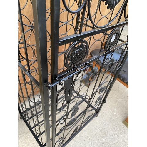 1588 - A METAL 45 SECTION WINE RACK WITH HINGED DOOR