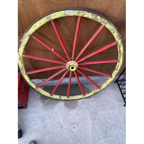 1590 - A WOODEN CART WHEEL WITH METAL BANDING