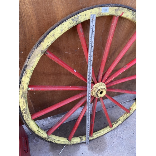 1590 - A WOODEN CART WHEEL WITH METAL BANDING