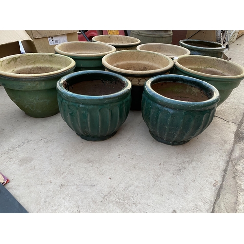 1624 - EIGHT GREEN GLAZED PLANTERS