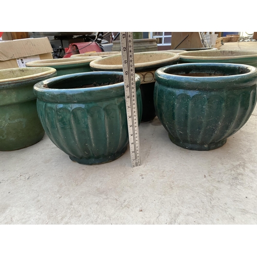 1624 - EIGHT GREEN GLAZED PLANTERS