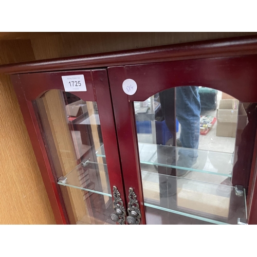 1725 - A WOODEN GLASS FRONTED DISPLAY CABINET