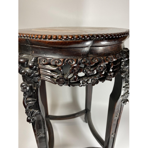 454 - A CHINESE CARVED ROSEWOOD AND MARBLE TOPPED JARDINIERE STAND, HEIGHT 62CM