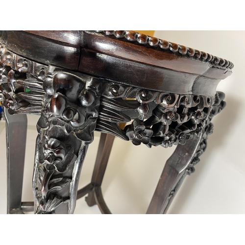 454 - A CHINESE CARVED ROSEWOOD AND MARBLE TOPPED JARDINIERE STAND, HEIGHT 62CM