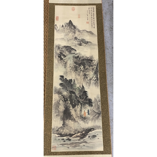 459 - A VINTAGE ORIENTAL MOUNTAIN SCENE SCROLL, LENGTH 195CM