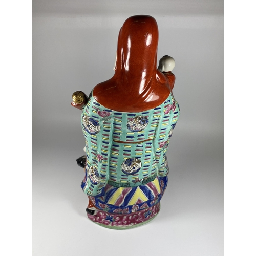 471 - A LARGE CHINESE STONEWARE IMMORTAL FIGURE, HEIGHT 42CM