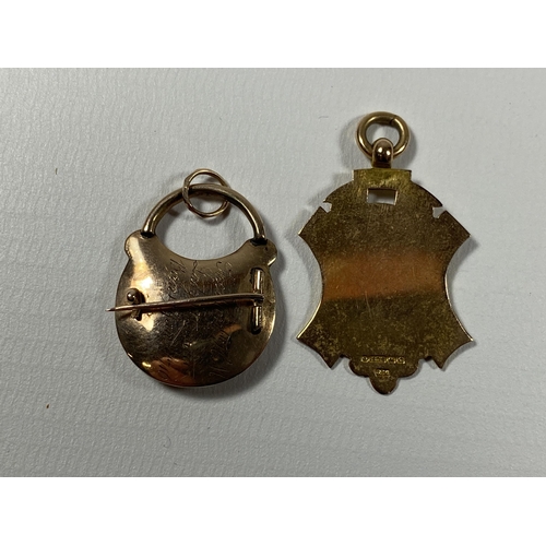 693 - A 9CT YELLOW GOLD FOB PENDANT AND A YELLOW METAL MEMORIAL LOCKET PENDANT, GOLD WEIGHT 4.65G