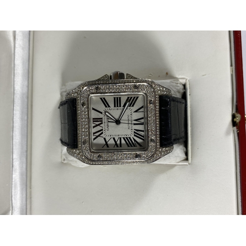 698 - A BOXED GENTS CARTIER SANTOS AUTOMATIC WATCH WITH DIAMOND SET DIAL, WORKING AT TIME OF CATALOGING