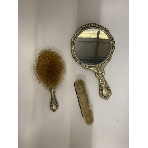 105 - A SILVER PLATED VINTAGE DRESSING TABLE BRUSH AND HAND MIRROR SET IN AN ART NOUVEAU STYLE