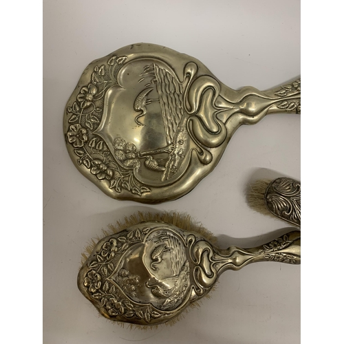 105 - A SILVER PLATED VINTAGE DRESSING TABLE BRUSH AND HAND MIRROR SET IN AN ART NOUVEAU STYLE