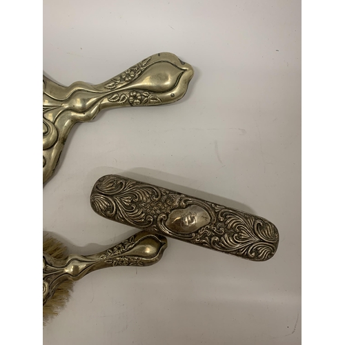 105 - A SILVER PLATED VINTAGE DRESSING TABLE BRUSH AND HAND MIRROR SET IN AN ART NOUVEAU STYLE