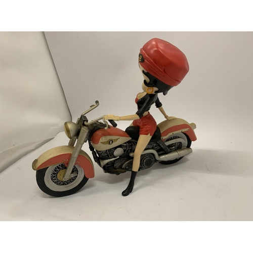 110 - A BETTY BOOP ON A MOTORBIKE MODEL HEIGHT 24CM, LENGTH 30CM