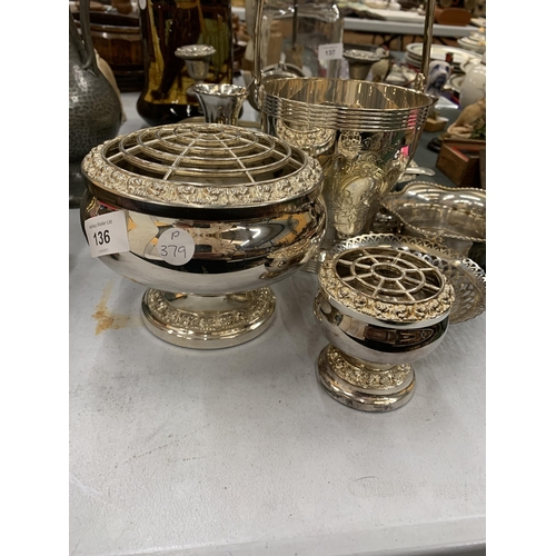 136 - A QUANTITY OF SILVER PLATED ITEMS TO INCLUDE ROSE BOWLS, A CANDLEABRA, BUD VASES, A HANDLED SERVING ... 