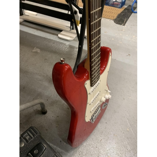 175 - A 'GEAR4MUSIC' RED ELECTRIC GUITAR & A STAGG ELECTRIC AMPLIFIER