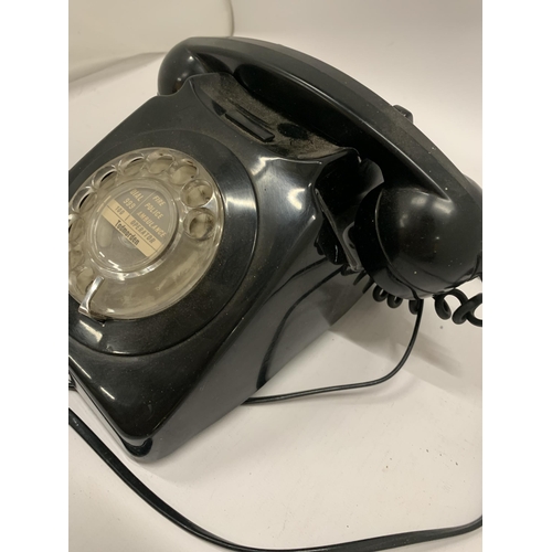 222 - A VINTAGE BLACK TELEPHONE