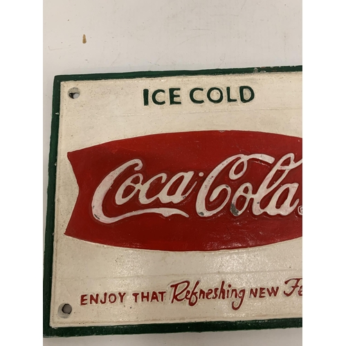 293 - A CAST 'ICE COLD COCA-COLA' SIGN 29CM X 20CM