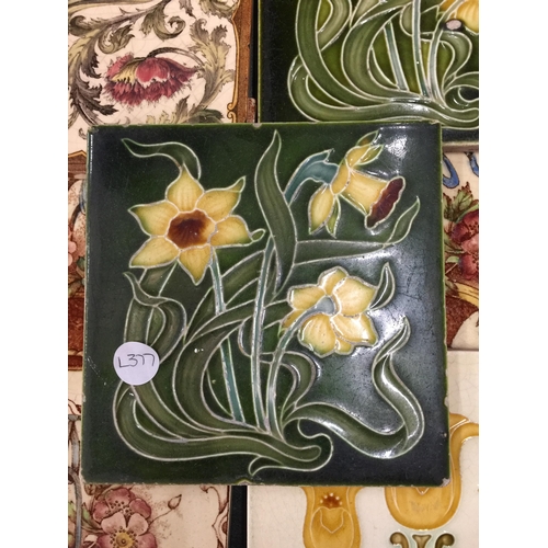 1003 - SEVEN VINTAGE WALL TILES, THREE WITH TUBE LINING FLOWERS