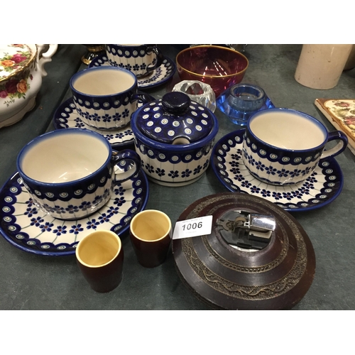 1006 - A QUANTITY OF POTTERY TO INCLUDE BLUE AND WHITE POLISH CUPS AND SAUCERS, GLASSWARE, A TABLE LIGHTER,... 