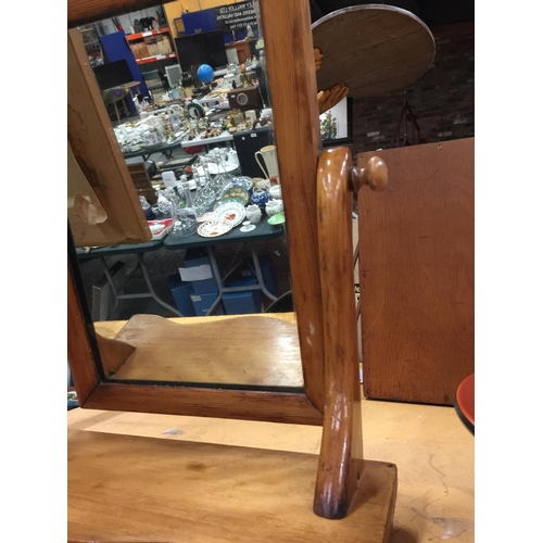 1018 - AN OAK FRAMED DRESSING TABLE MIRROR