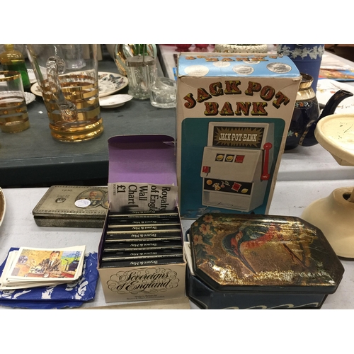 1043 - A QUANTITY OF CIGARETTE CARDS IN ALBUMS, LOOSE CARDS PLUS VINTAGE TINS, A JACKPOT BANK AND BRYANT AN... 