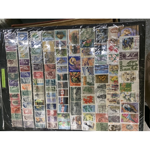 919 - A COLLECTION OF VINTAGE BRITISH AND WORLD STAMPS TO INCLUDE TWO ALBUMS