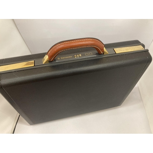 930 - A SAMSONITE HARD BRIEFCASE WITH COMBINATION LOCK, CODE NUMBER AVAILABLE