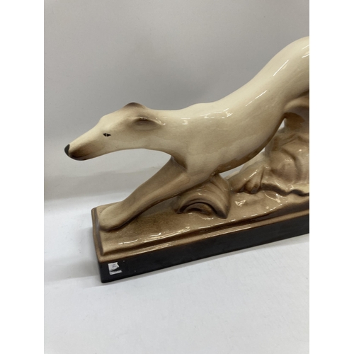 944 - A LARGE CERAMIC GREYHOUND LENGTH 43CM