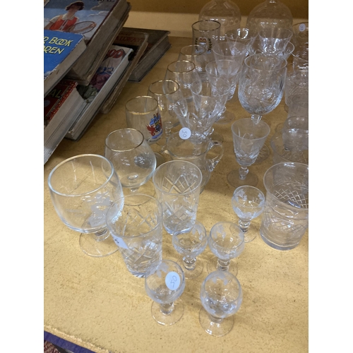 955 - A LARGE QUANTITY OF GLASSWARE TO INCLUDE CUT GLASS - ETCHED DECANTERS, DESSERT BOWLS, LICQUER GLASSE... 