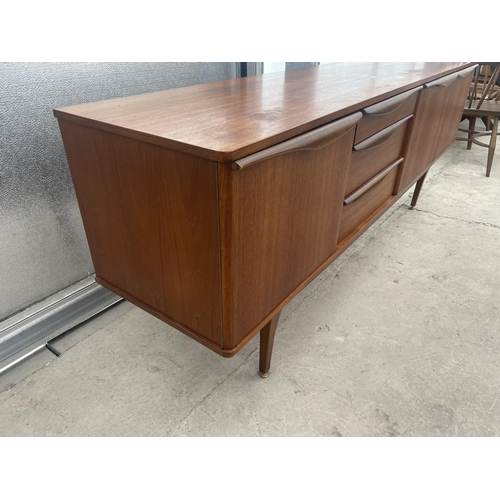 2501 - A RETRO TEAK STONEHILL FURNITURE SIDEBOARD ENCLOSING THREE DRAWERS AND THEE CUPBOARDS, 78