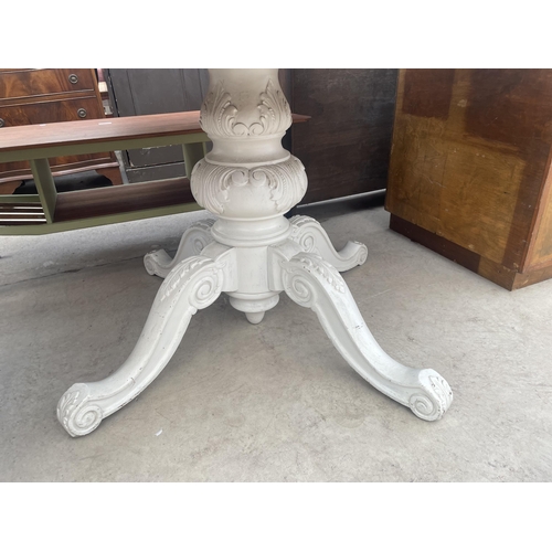 2772 - A PAINTED DINING TABLE ON QUATREFOIL BASE WITH SUBSTANTIAL CARVED COLUMN - 46.5