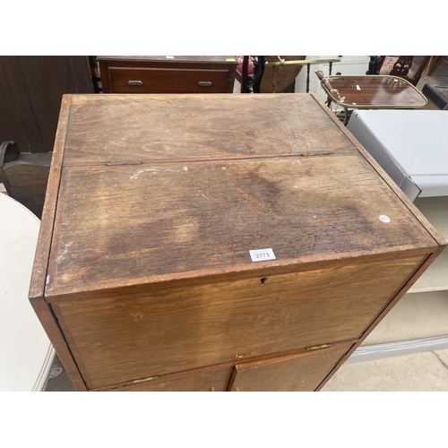 2773 - A MID 20TH CENTURY BUREAU CABINET, 26