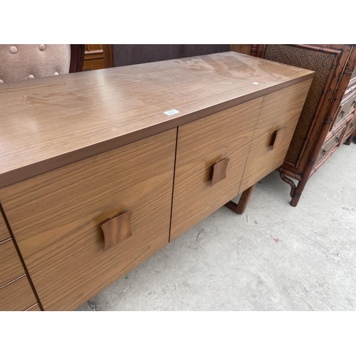 2777 - A RETRO TEAK 'EUROPA FURNITURE' SIDEBOARD ENCLOSING THREE CUPBOARDS, ONE WITH DROP-DOWN FRONT AND FO... 