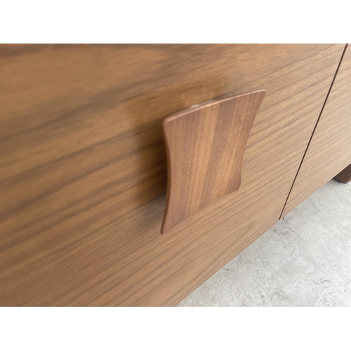 2777 - A RETRO TEAK 'EUROPA FURNITURE' SIDEBOARD ENCLOSING THREE CUPBOARDS, ONE WITH DROP-DOWN FRONT AND FO... 