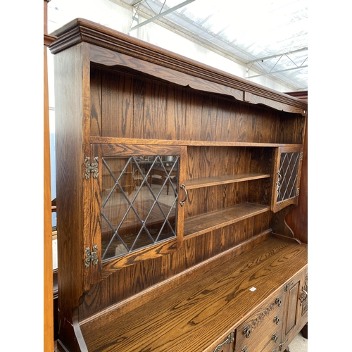 2704 - AN OAK 'WEBBER FURNITURE' DRESSER WITH CUPBOARDS AND DRAWERS TO THE BASE, THE UPPER PORTION HAVING S... 