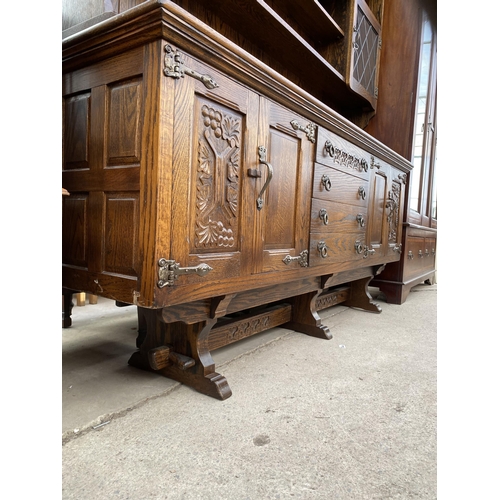 2704 - AN OAK 'WEBBER FURNITURE' DRESSER WITH CUPBOARDS AND DRAWERS TO THE BASE, THE UPPER PORTION HAVING S... 