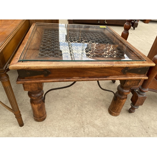 2716 - A HARDWOOD LAMP TABLE WITH GLASS TOP AND METALWARE DECORATION AND MAHOGANY CROSSBANDED COFFEE TABLE