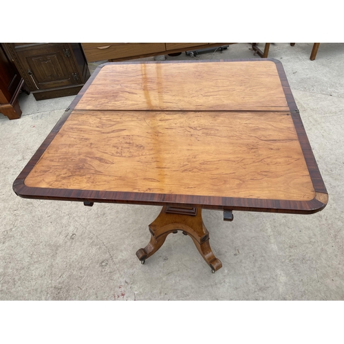 2721 - A 19TH CENTURY MAPLE AND MAHOGANY CROSSBANDED FOLD-OVER TEA TABLE ON PEDESTAL BASE