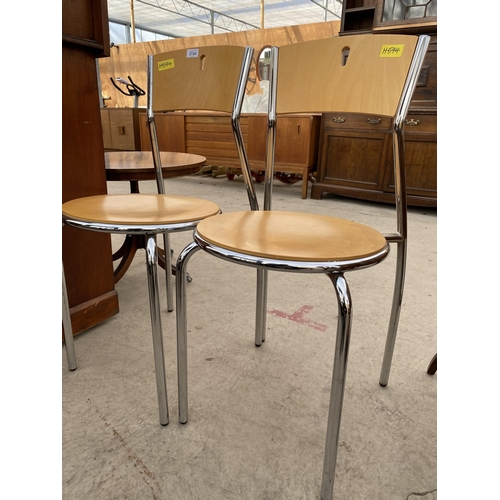 2724 - A PAIR OF KITCHEN CHAIRS ON POLISHED CHROME TUBULAR FRAMES