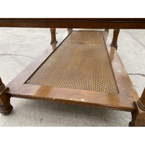 2726 - A HARDWOOD AND WICKER COFFEE TABLE WITH INSET GLASS TOP, 51 X 21