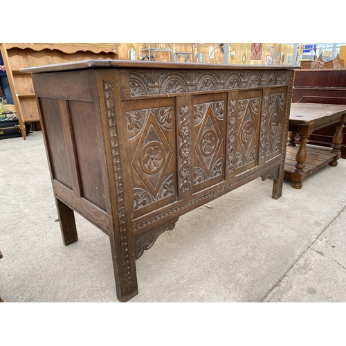 2727 - A OAK BLANKET CHEST WITH FOUR CARVED FRONT PANELS, 51