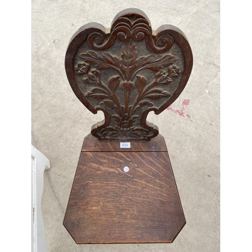 2747 - A VICTORIAN OAK HALL CHAIR WITH CARVED FOLIATE BACK