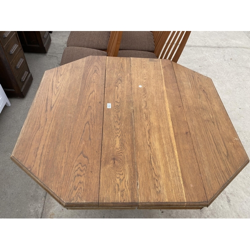 2750 - AN ART DECO OAK OCTAGONAL DINING TABLE ON SQUARE COLUMN WITH STEPPED FEET, 44X41